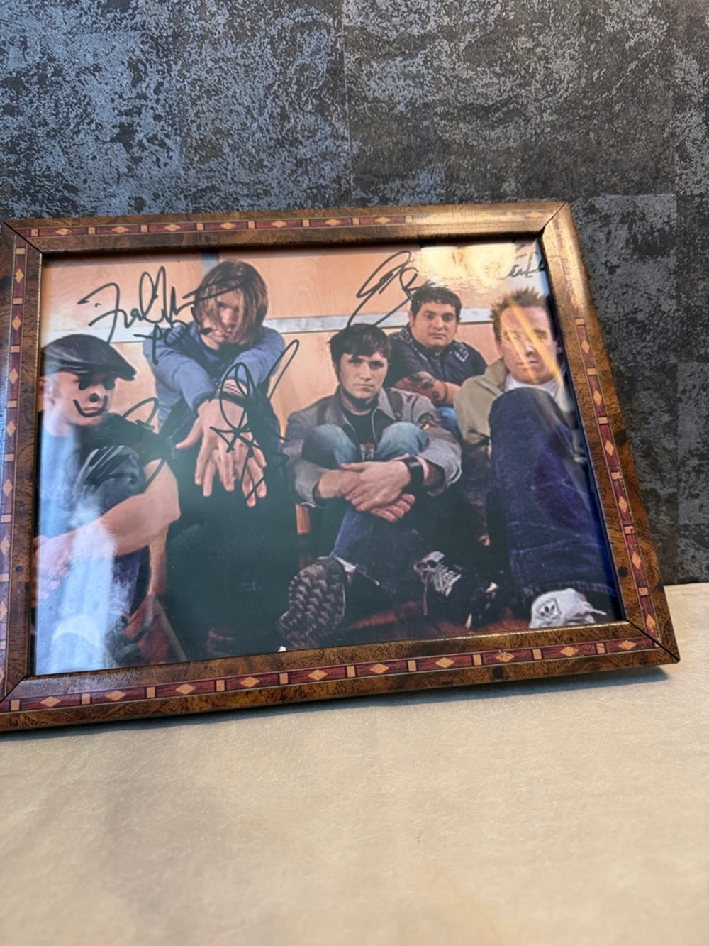 Autographed Taking Back Sunday photo in Brown Frame